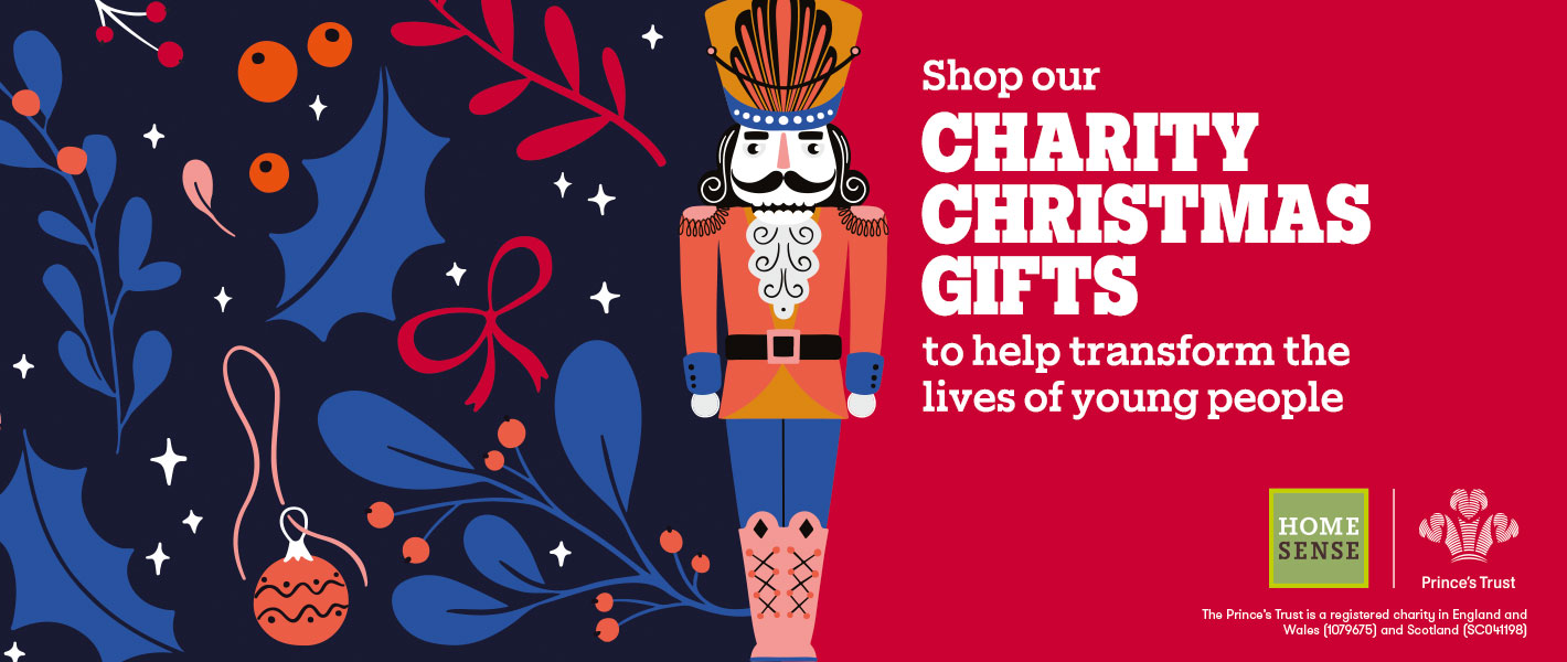 A festive ad featuring a nutcracker and holiday decorations, promoting charity Christmas gifts to support The Prince's Trust.