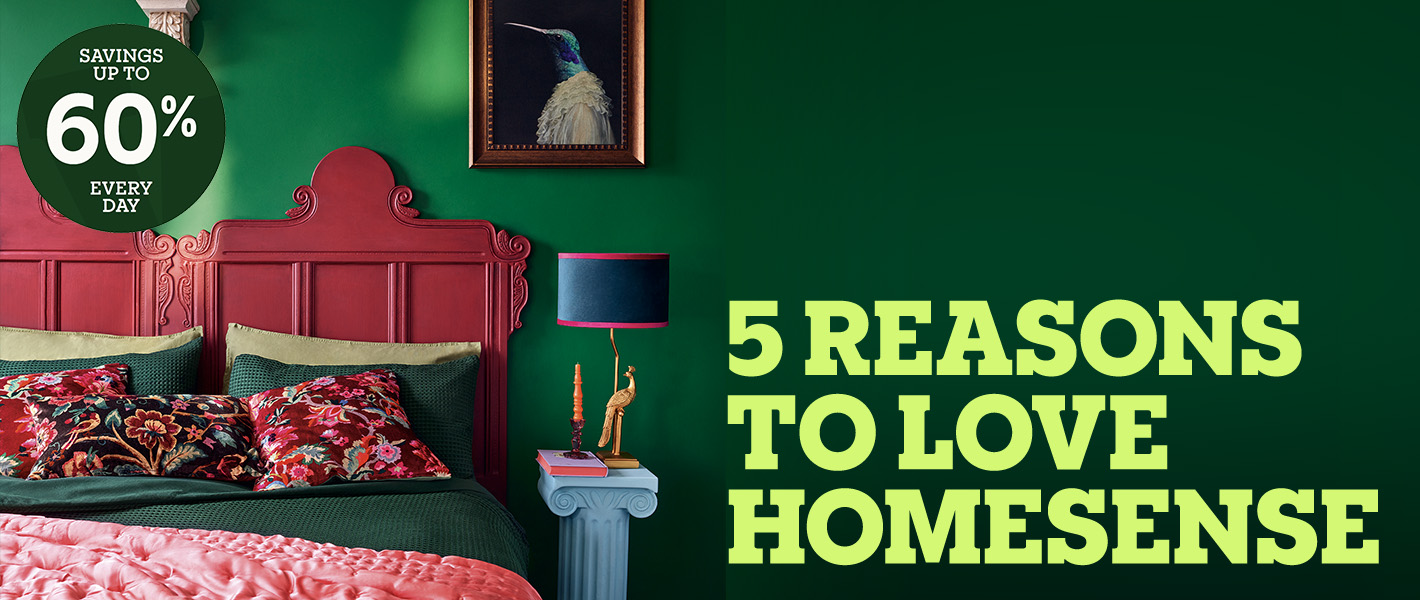 A vibrant bedroom with a red bed frame, floral pillows, and decorative accents, with a "Savings up to 60%" offer.